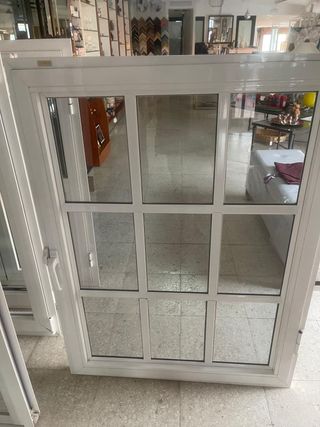 Ventana de aluminio con palilleria exterior