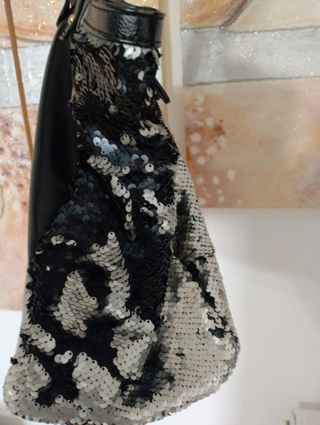 Borsa tracolla con glitter girevoli