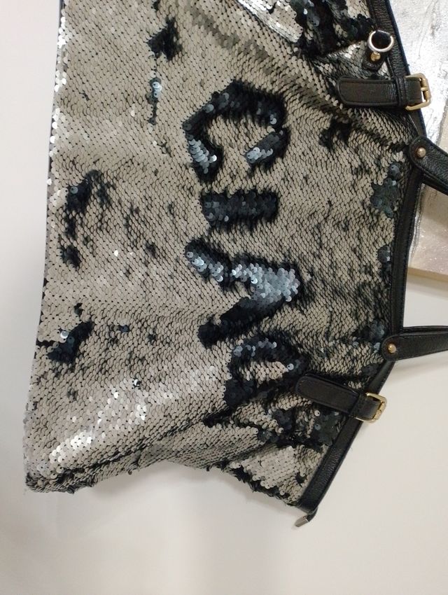 Borsa tracolla con glitter girevoli