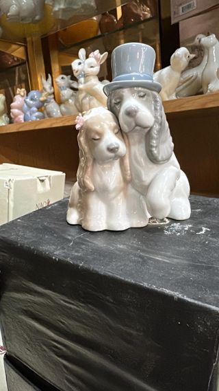 Figura de porcelana Nao Lladro y dos colgantes