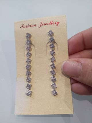 Tre orecchini pendenti