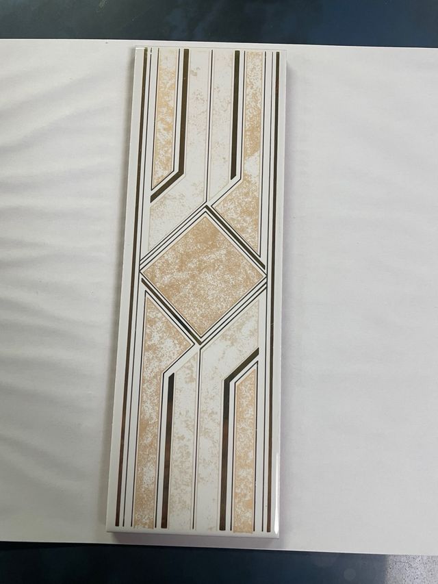 CENEFA CERAMICA 6,5X20 CM. ORO Y NEGRO (BLANCO)