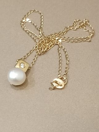 Cadena oro con colgante perla 
