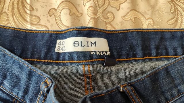 Jeans uomo Kiabi nero, blu e azzurro