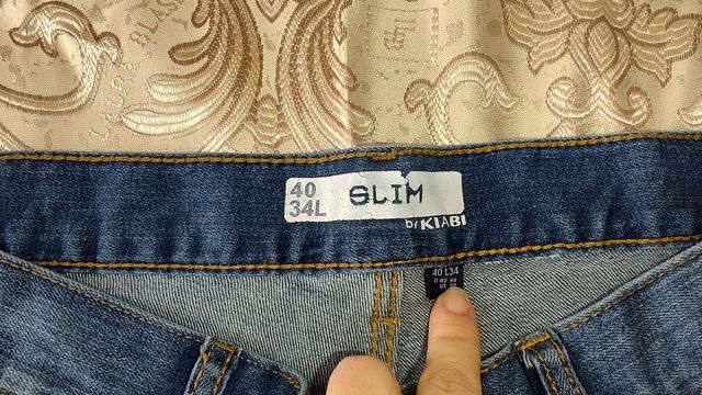 Jeans uomo Kiabi nero, blu e azzurro