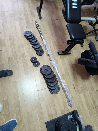 Barra 160cm nueva y 21kg en discos