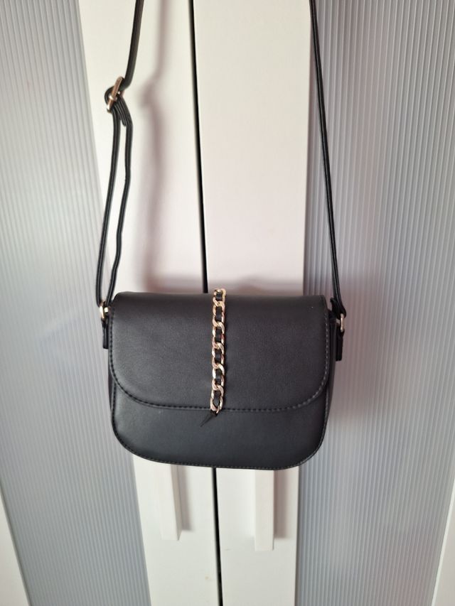 Bolso bandolera negro y dorado