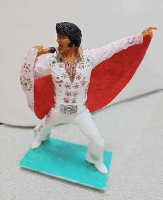 figura de Elvis Presley.Mas bonita en mano.