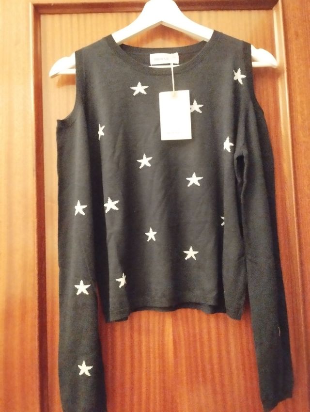 Jersey de mujer con los hombros al aire