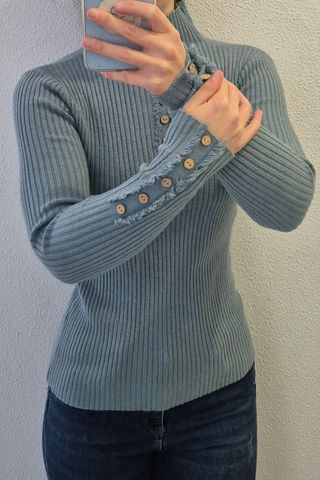 Jersey cuello alto botones