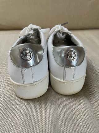 Playeras blancas. Michael Kors