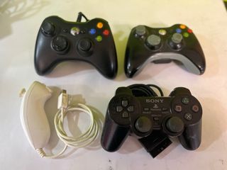 Lote de mandos de consolas averiados