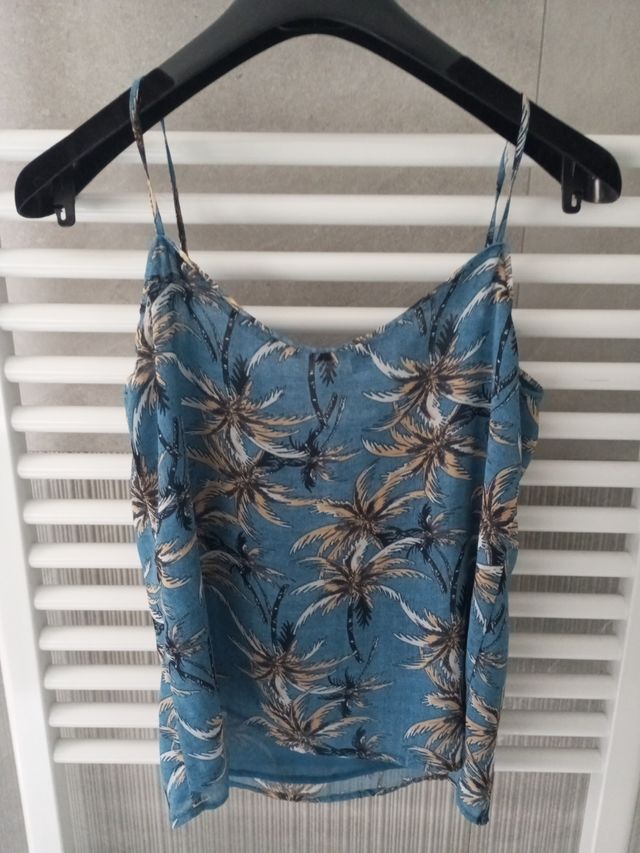 Top smanicato con palme MANGO