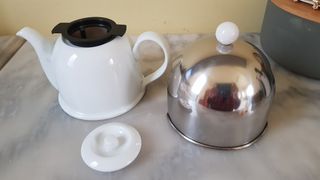 Tetera porcelana con funda protectora