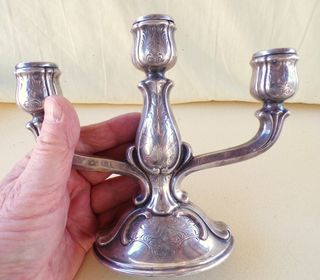 Candelabro antiguo bañado en plata