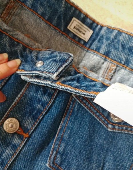 Falda corta vaquera. Pimkie