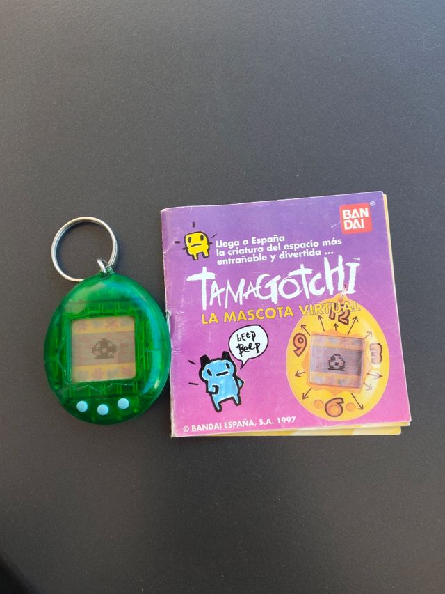 Tamagotchi bandai 1997 verde con instru