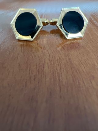 Gemelos dorados y negros