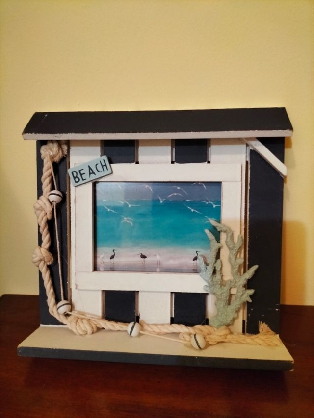 Portafoto e barchetta in legno