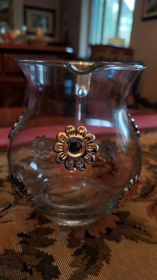 Brocca con fiori in argento