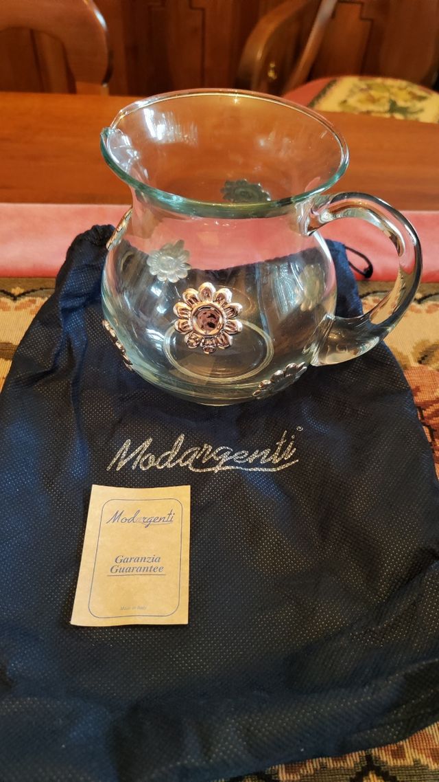 Brocca con fiori in argento