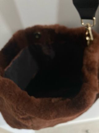 chaleco y bolso de Zorros de Canada