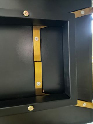 Aparador Westwing negro patas doradas