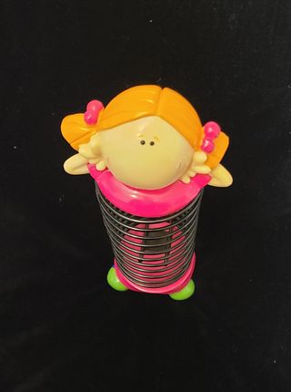 Sujeta CDs estantería