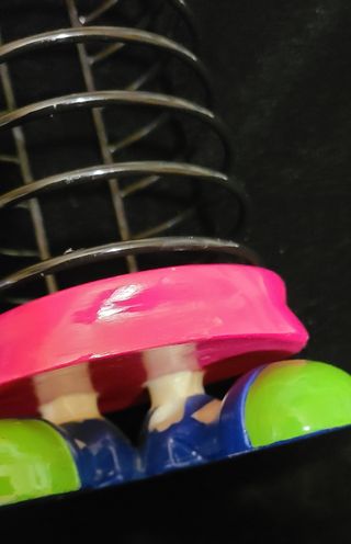 Sujeta CDs estantería