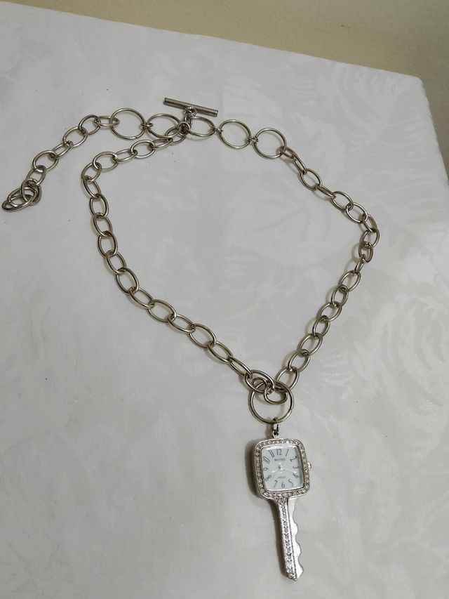 Collana argentata con orologio pendente nuova!!