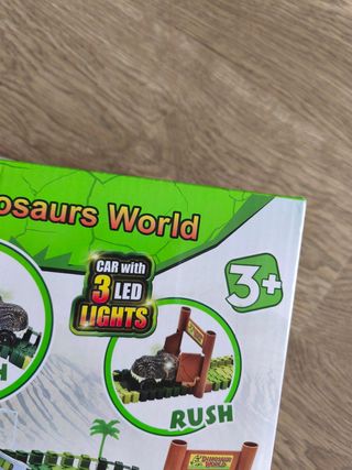 Scalextric de dinosaurio