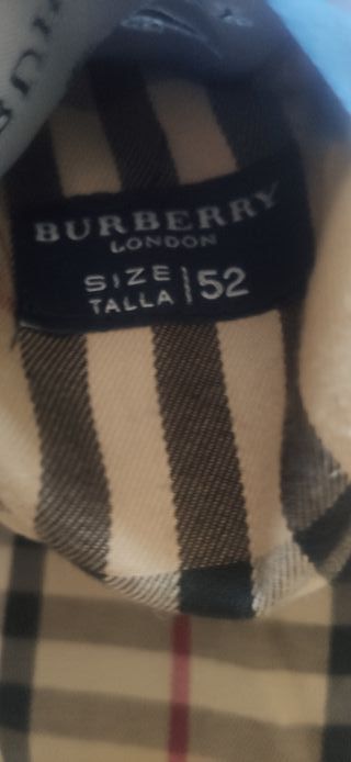 Gabardina Burberry negra. Oferta!.