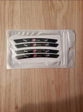 Pack 4 Uds. emblemas llantas Audi,logo de SLine.
