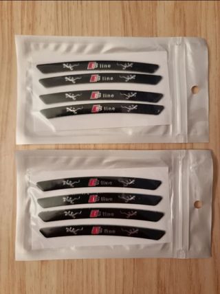 Pack 4 Uds. emblemas llantas Audi,logo de SLine.