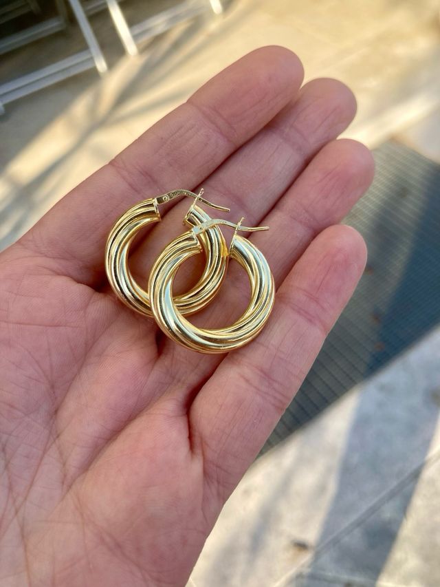 Orecchini a cerchio intrecciati argento dorato
