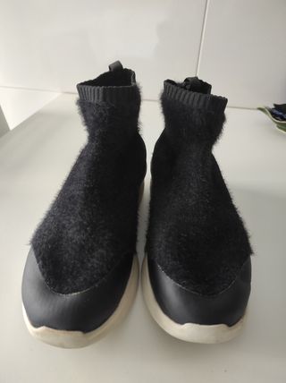 Botines negros de pelo