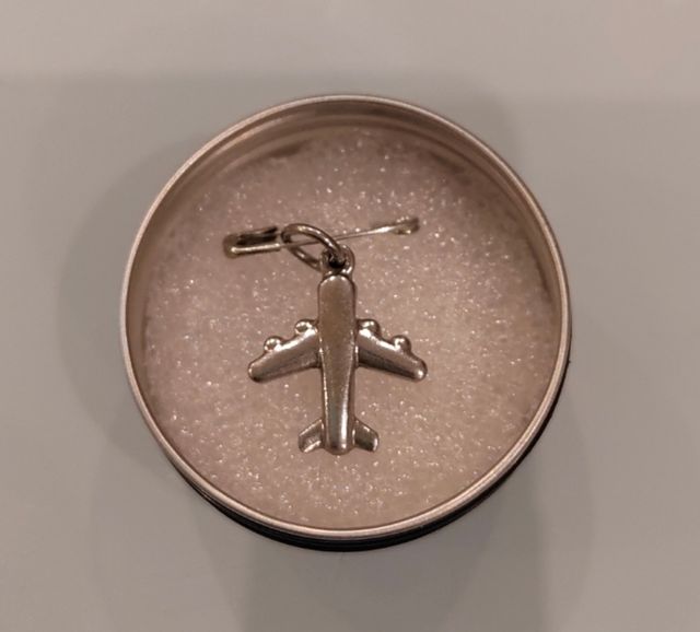 Dije de acero quirúrgico Avión