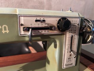 Maquina de coser SINGER alfa