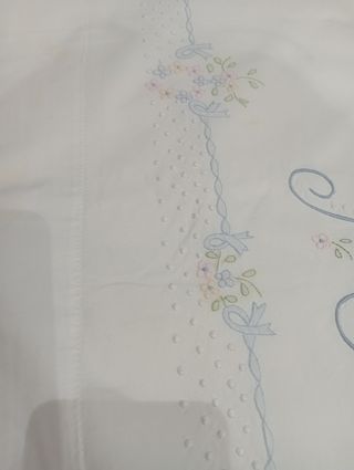 Sábana bordada a mano 90