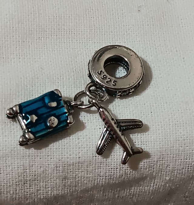 Charm plata de ley viajar