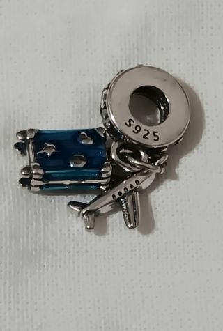 Charm plata de ley viajar