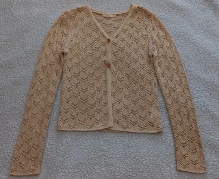 Rebeca de hilo calada beige de niña de Sfera