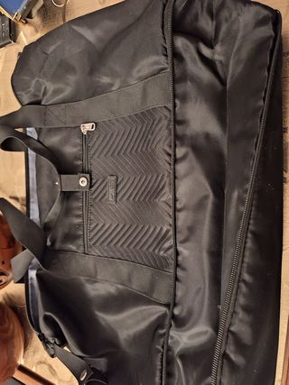 Estupenda bolsa de mano de viaje