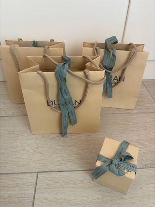 lote bolsas y cajas Duran Exquise