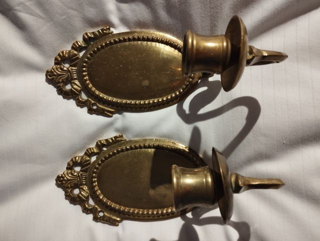 Pareja. Apliques de pared. Bronce. Vela