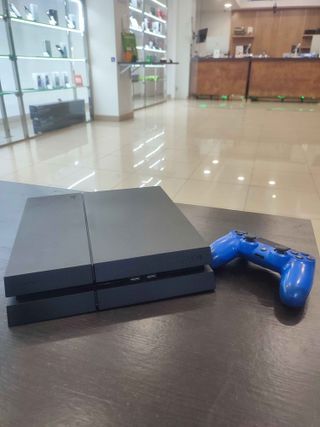 PS4 FAT 1Tb + DualShock original Seminuevo