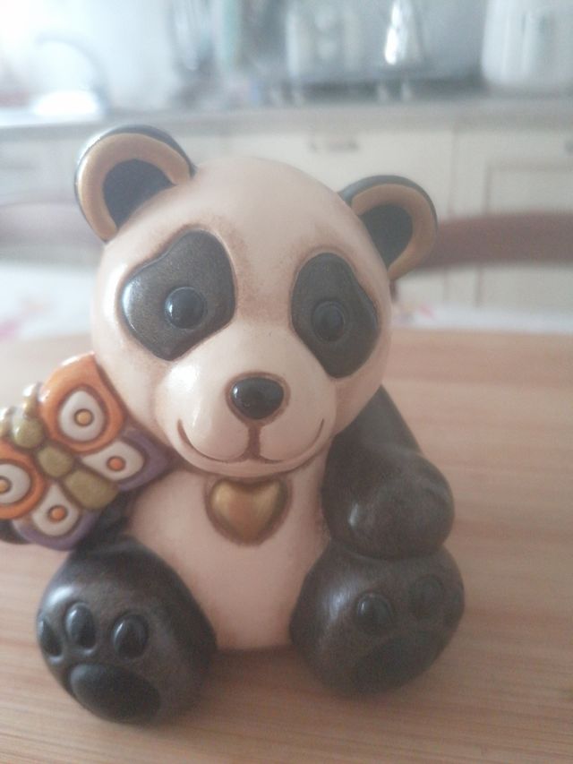 Panda thun con farfalla