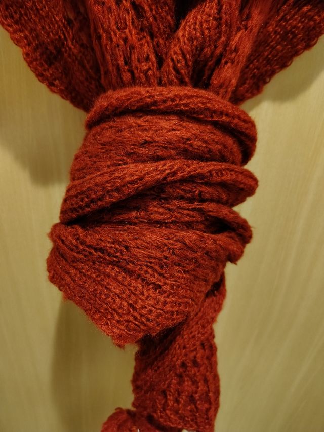 Bufanda de punto color caldera