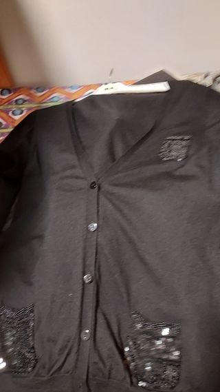 Jersey con bolsillos con lentejuelas