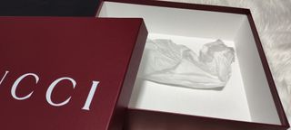 Caja y bolsa Gucci 